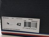 a black box with a red, white, and blue label on it