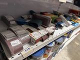 many different types of sand on the shelves in the store