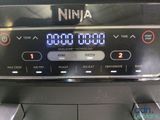 a close up of a digital clock on the side of a machine
