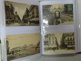 an open book with pictures of buildings on it
