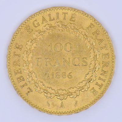 une image représentant une pièce d'or ornée d'une couronne sur l'avers