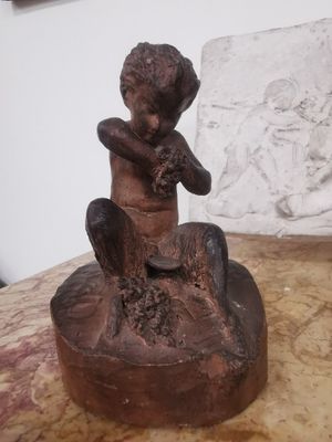 Paire de faunes en terre cuite Signée et datée AVE 58