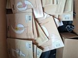 a cardboard box full of boxes and papers in it