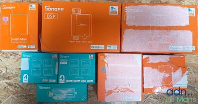 four boxes of different sizes and colors of a cell phone