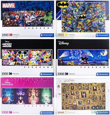 Plusieurs puzzles représentant différents personnages sont disposés sur une surface blanche.