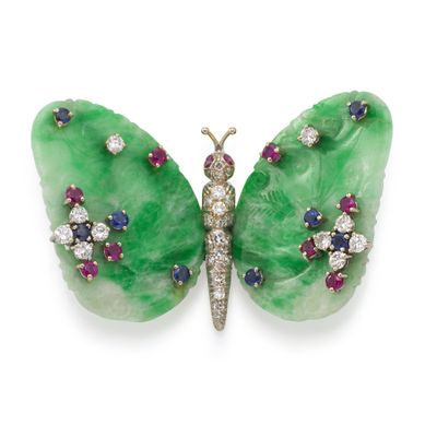 an image of a green butterfly brooch with diamonds and rubies