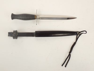 two knives that are laying on a table