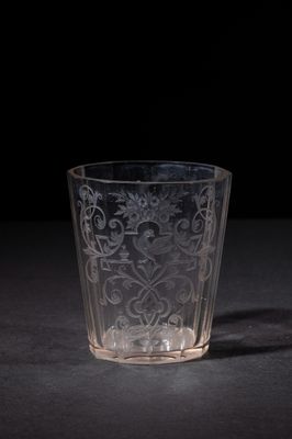 an image of a glass with a pattern on it on a table