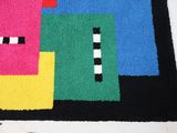 a rug made to look like a piece of art