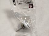 a small white object in a plastic bag on a table