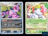two pokemon cards are shown side by side on a black background