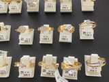 a lot of different rings on display on a table