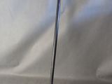 a close up of a walking stick on a white background