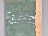 an image of a piece of wood with a green paint on it