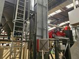 an image of a factory with a lot of machinery