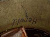 a close up of a hat with writing on it