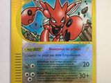 a close up of a pokemon card on a white surface