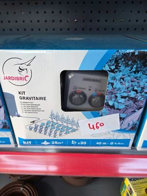 a box with a remote control on it in a store