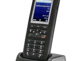 une image représentant un téléphone portable posé sur un support