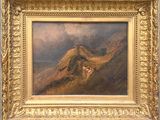 une image d'un tableau représentant une scène de montagne dans un cadre doré