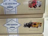 three boxes with different types of fire trucks on them