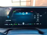 the dashboard of a car with a digital display on it