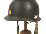 helmet on a wooden stand on a white surface with a white background