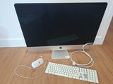 a computer monitor, keyboard, mouse and mouse on the floor