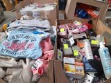 many boxes of clothing and other items in a garage
