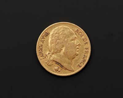l'image d'une pièce d'or sur une surface noire
