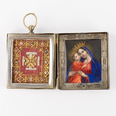 an image of a picture of a woman holding a child in a box