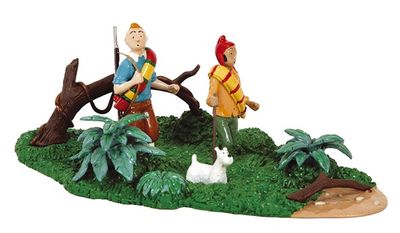une figurine représentant un homme et une femme dans une forêt