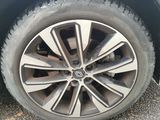 a close up of a tire on a car ' s rim