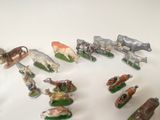 many figurines of animals that are on a table
