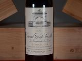 a bottle of wine that is sitting on a table