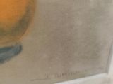a picture of a painting of an orange on a table
