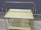 an image of a metal shelf with two shelves on it