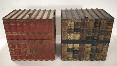 two books are stacked on top of each other on a table
