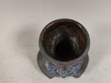 a small vase that is sitting on a table