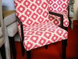 many chairs that are lined up in a room
