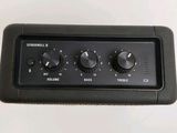a close up of the controls on a guitar amplifier