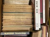 a box full of books that are sitting on a table