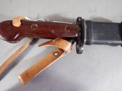 a knife that is laying on top of a table