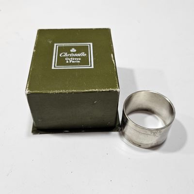 a box with a ring inside of it on a table