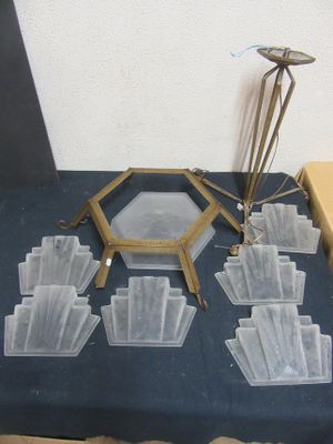 a table that has a bunch of glass items on it