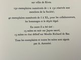 an open book with a poem written in french on it