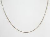 a close up of a necklace on a mannequin mannequin mannequin mannequin mannequin mannequin mannequin mannequin