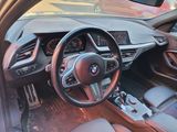 a view of the inside of a car from the driver ' s seat