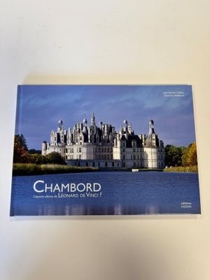 a book with a picture of a castle in the middle of it