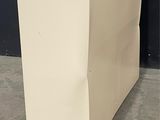 a white box that is sitting on the floor
